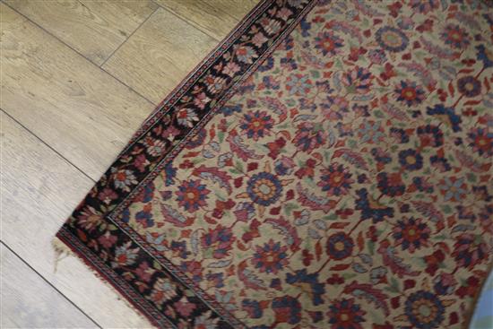 A Persian cream ground mat, 3ft 6in. x 2ft 11in.